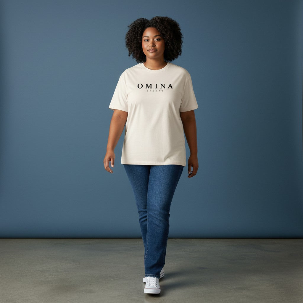 Omina Studio unisex vintage wash boxy fit t-shirt in cream with black Omina Studio logo on the chest.