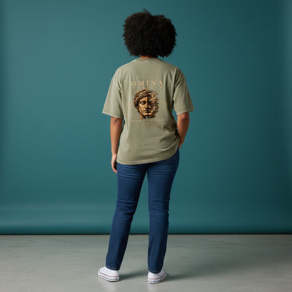 Omina Studio unisex vintage wash boxy t-shirt in olive green, featuring a distressed graphic of a classical bust split in half with text.