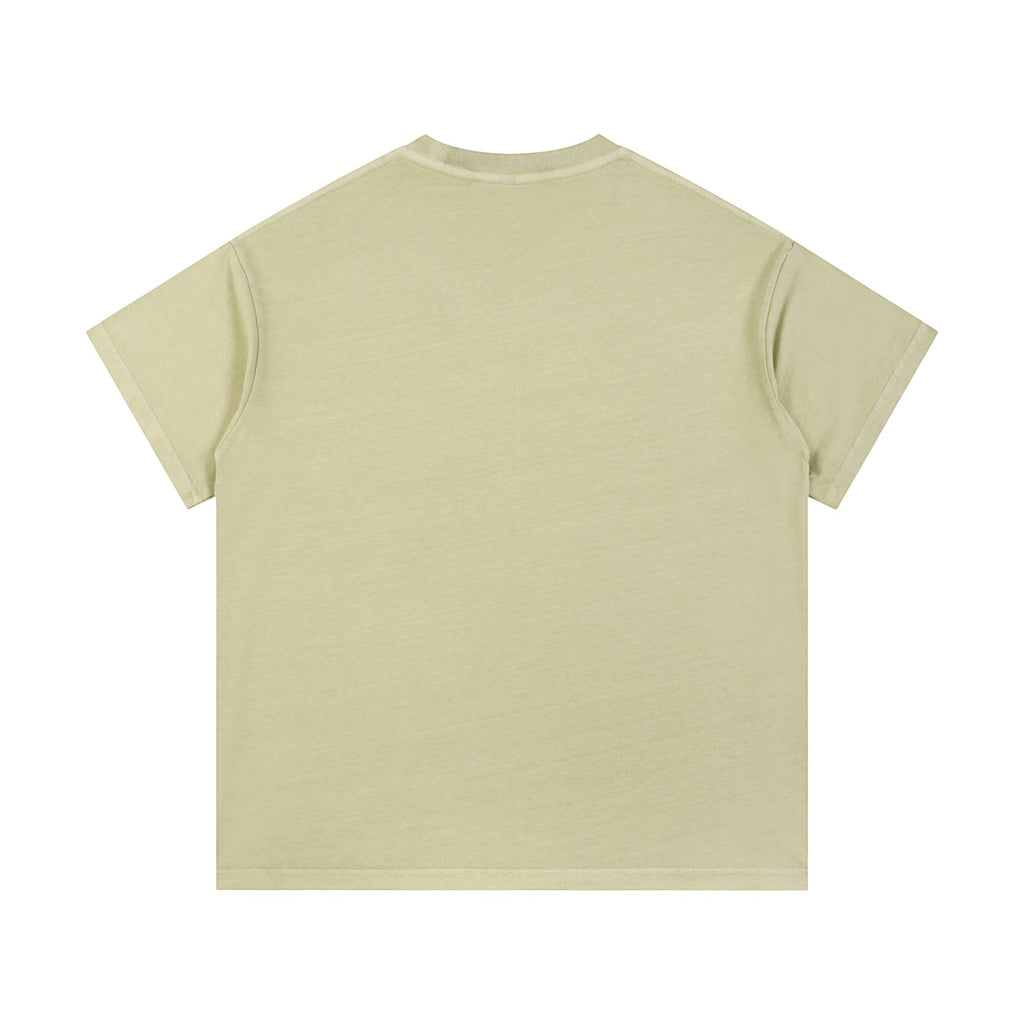Omina Studio light green vintage wash 100% cotton unisex t-shirt with short sleeves and round neck.