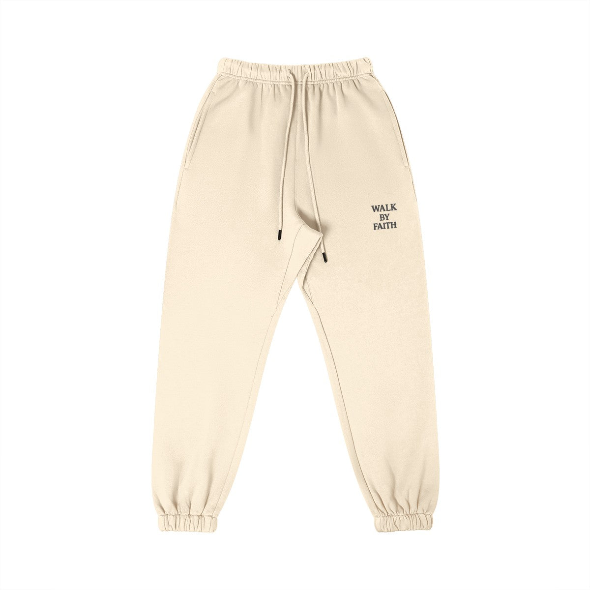Omina Studio Walk By Faith cream heavyweight cotton sweatpants with tapered fit and drawstring.