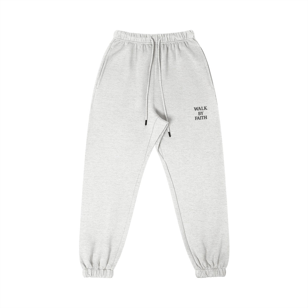 Omina Studio light grey cotton sweatpants with "Walk By Faith" text graphic on the right thigh.