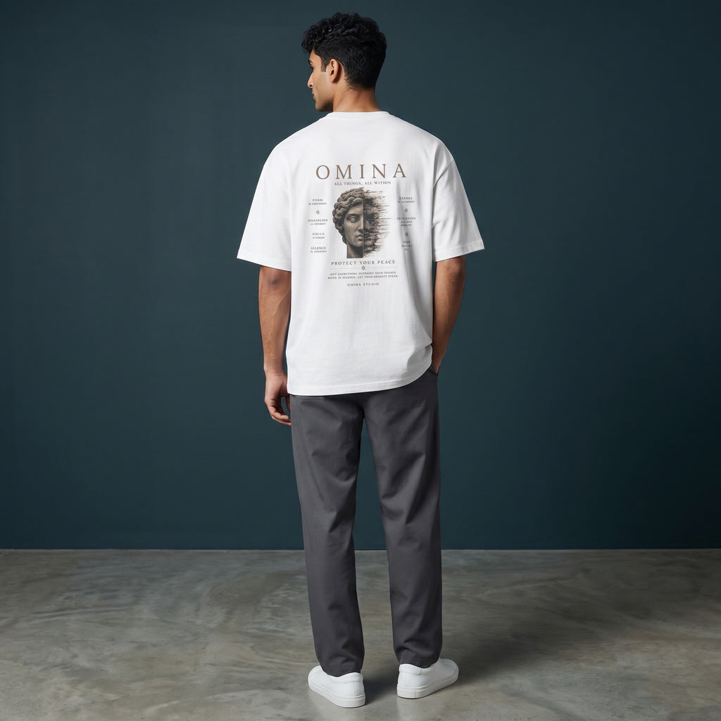 Omina Studio white 100% cotton oversized fit crew neck t-shirt with graphic print on back.