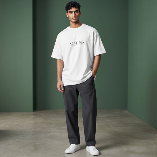 Omina Studio white 100% cotton oversized fit crew neck t-shirt with drop shoulders and minimalist logo.