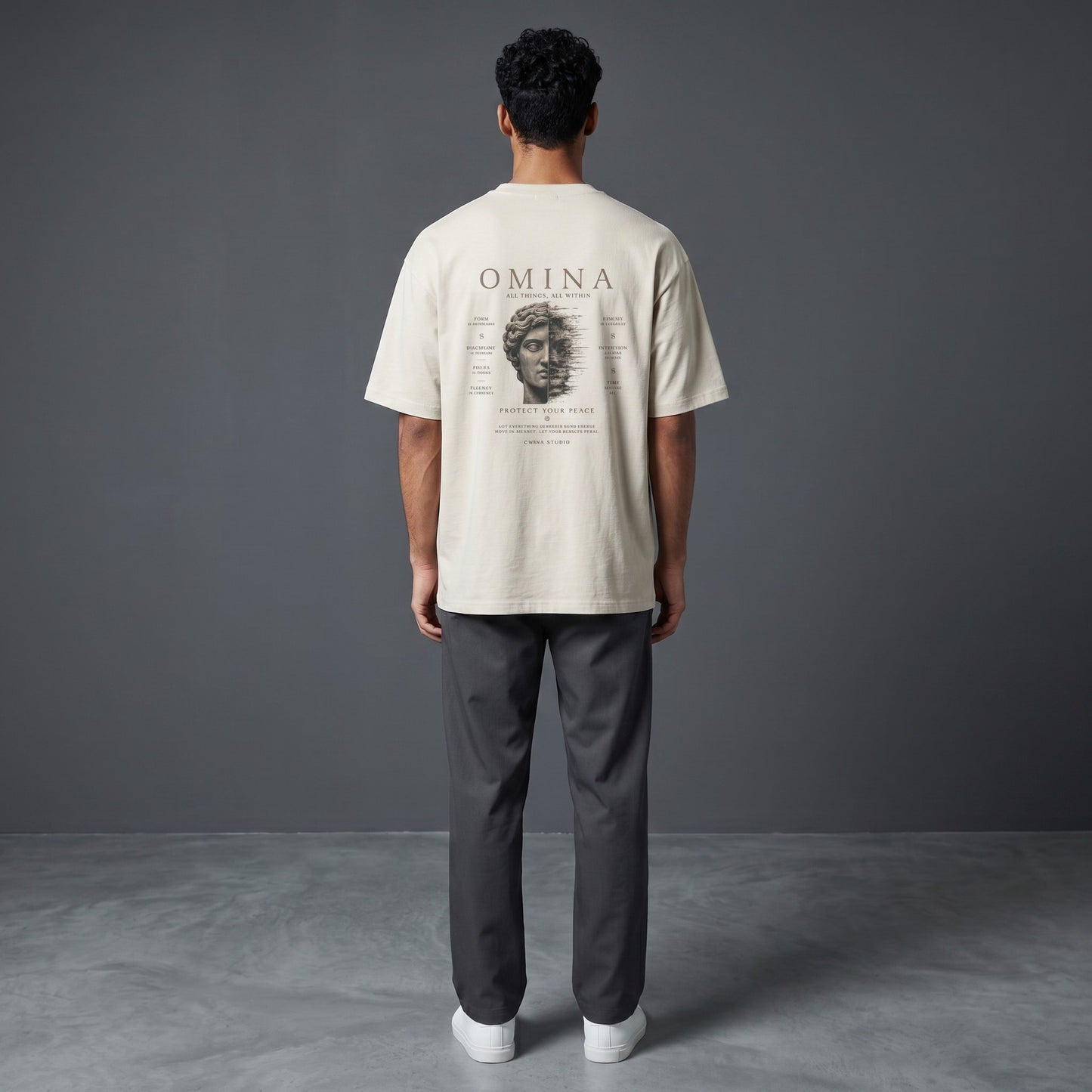 Omina Studio oversized fit crew neck t-shirt in light beige, 100% cotton with graphic print on back.