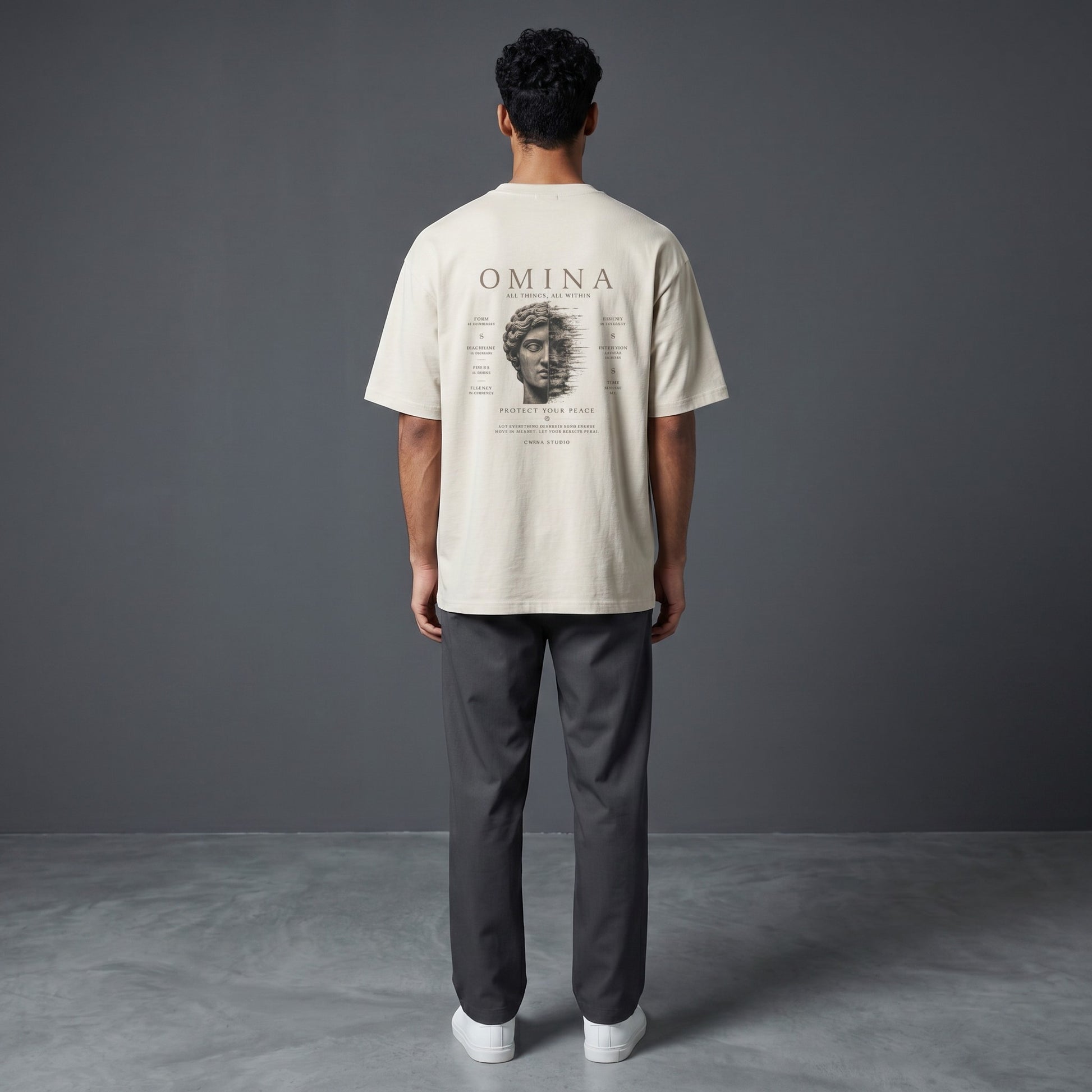 Omina Studio oversized fit crew neck t-shirt in light beige, 100% cotton with graphic print on back.