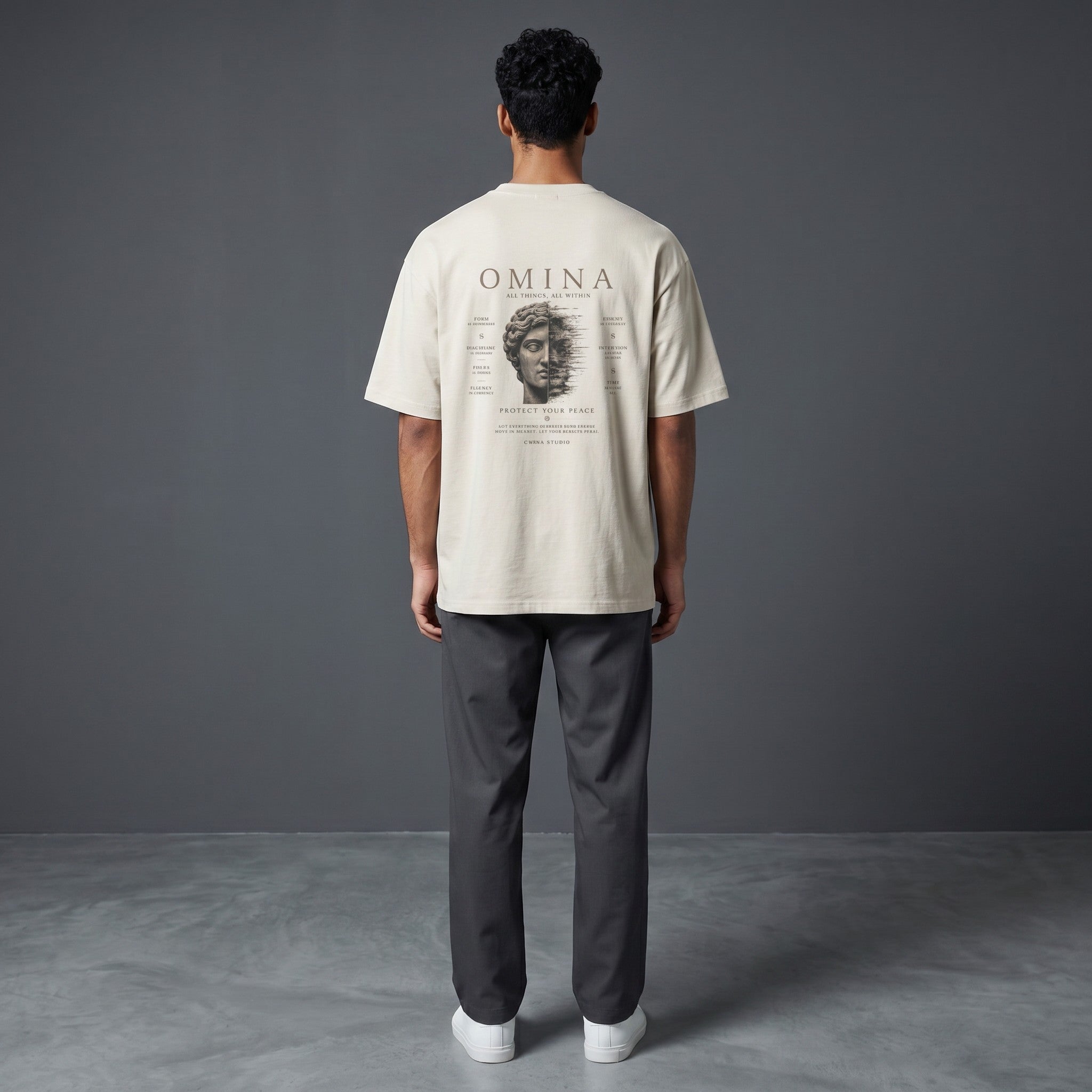 Omina Studio oversized fit crew neck t-shirt in light beige, 100% cotton with graphic print on back.