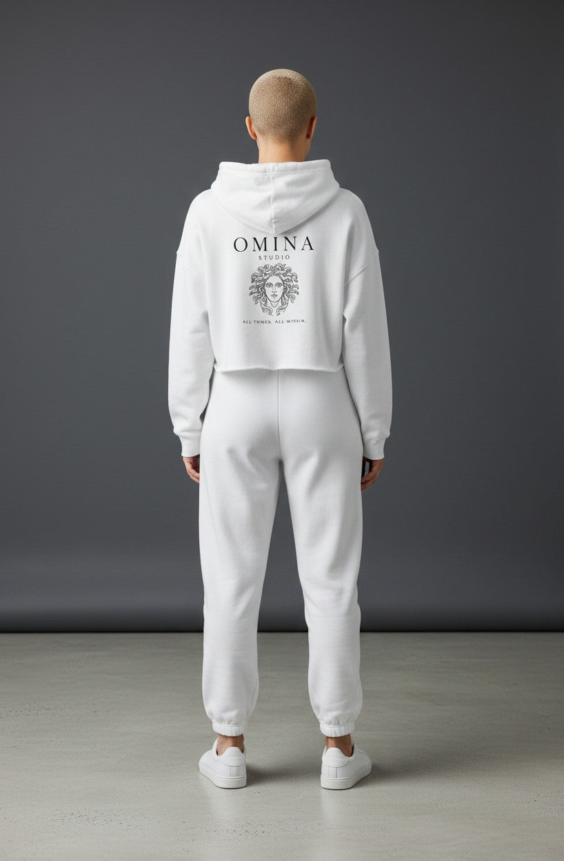 Omina Studio white lightweight cropped hoodie with adjustable drawstring hood and graphic print on back.