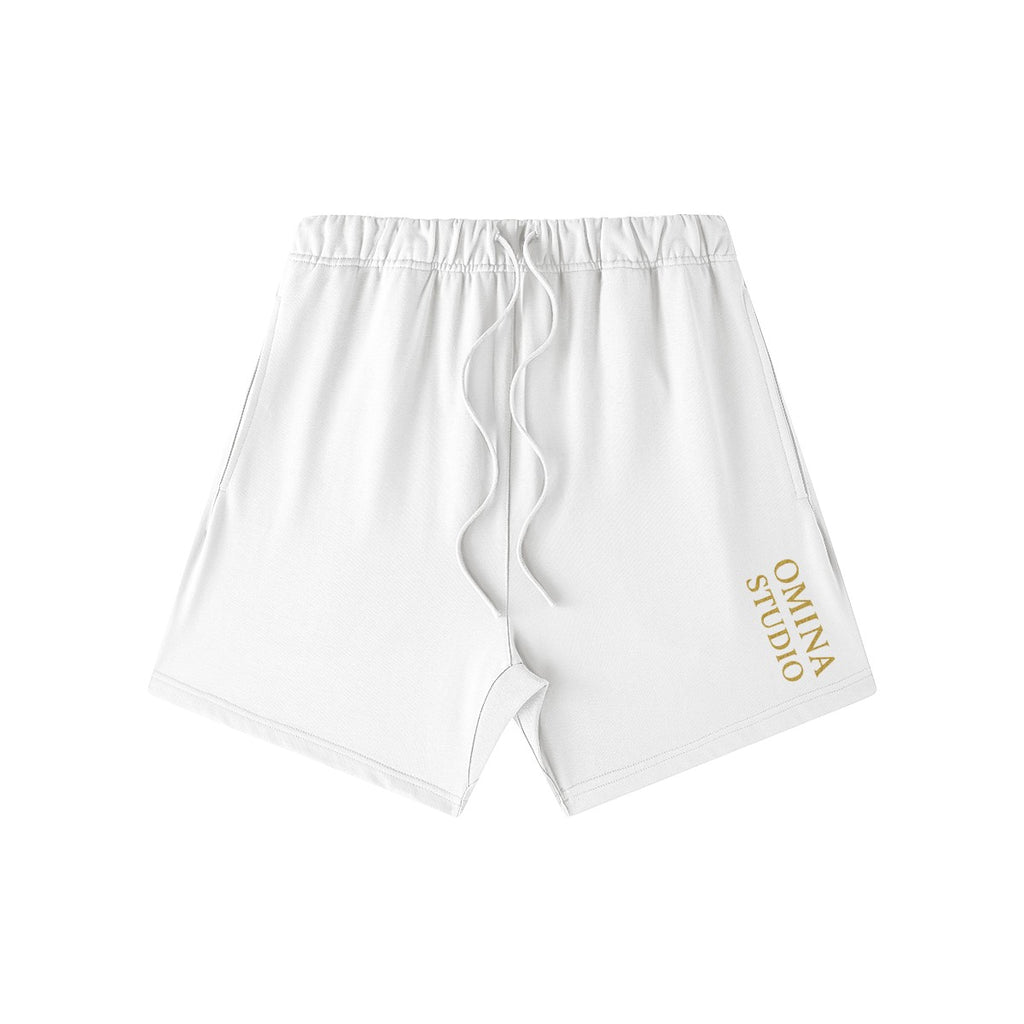 Omina Studio white heavyweight cotton French terry shorts with drawstring and gold logo detail