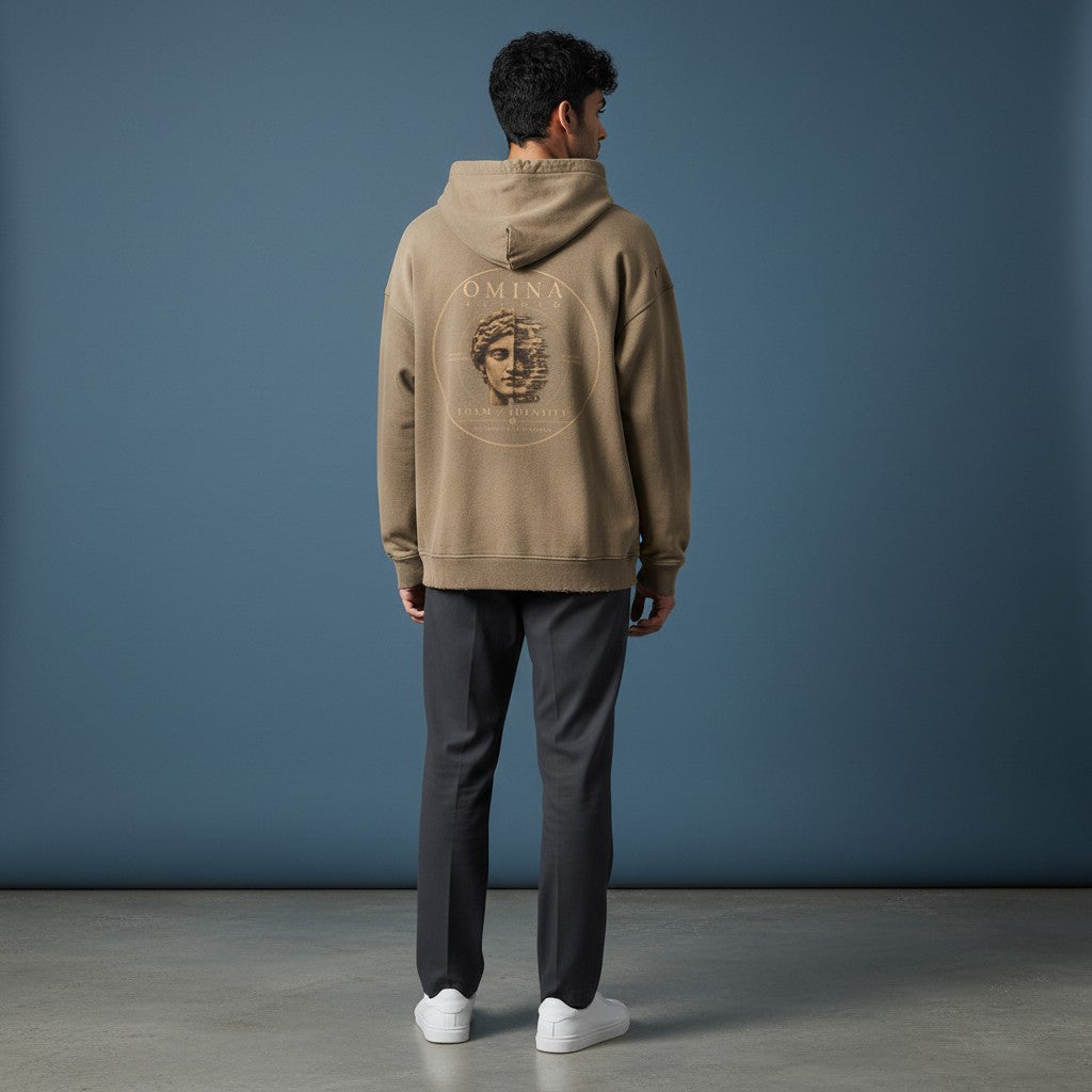 Omina Studio taupe cotton blend hoodie with faded graphic print of a split face and distressed details.