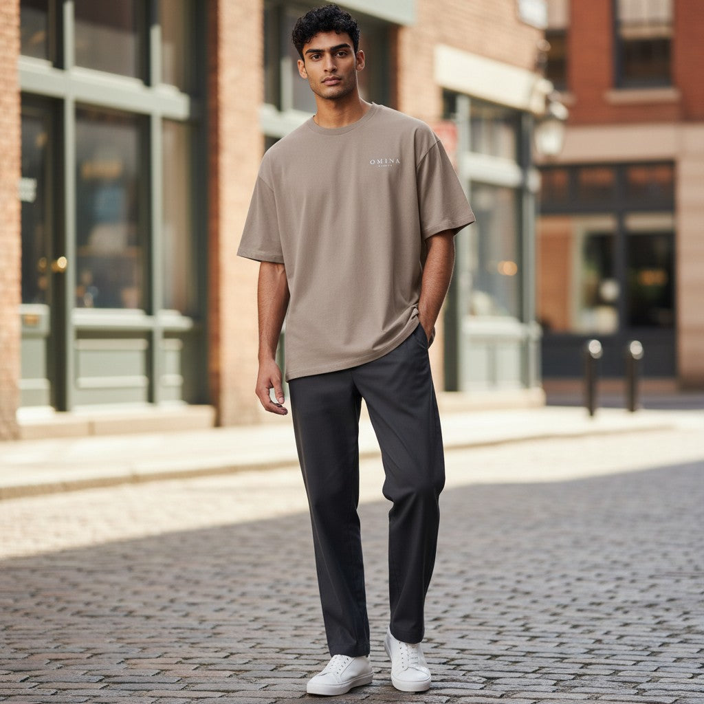 OMINA Studio heavyweight cotton t-shirt in taupe with subtle logo print on chest.