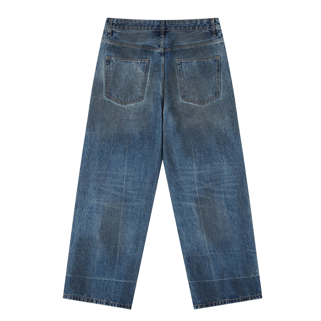 OMINA Omina Essentials vintage wash baggy denim jeans with a relaxed fit and wide-leg silhouette.