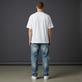 OMINA Vintage Wash Distressed Denim Jeans - Light blue wash, relaxed fit, distressed detailing, and ripped hems.