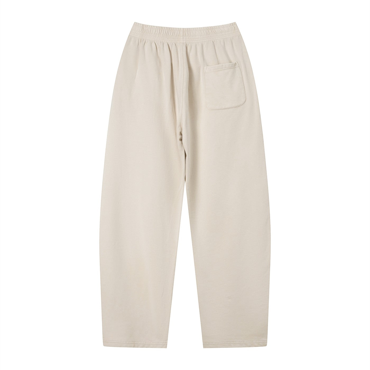 Omina Studio unisex vintage wash loose sweatpants in light beige, made from a soft heavyweight cotton blend with a single back pocket.
