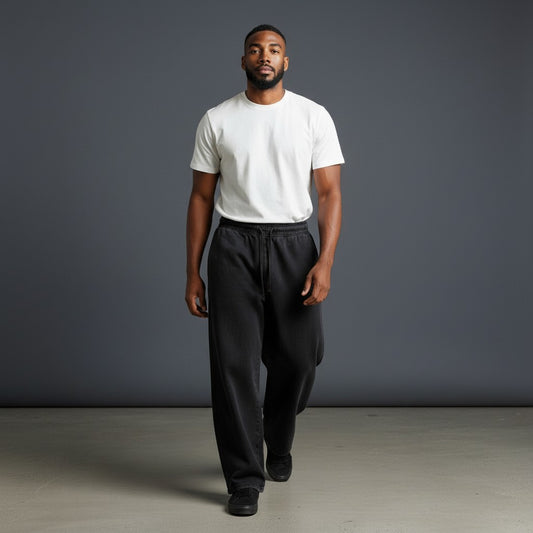 Omina Studio unisex vintage wash black cotton blend loose fit sweatpants with drawstring waist.