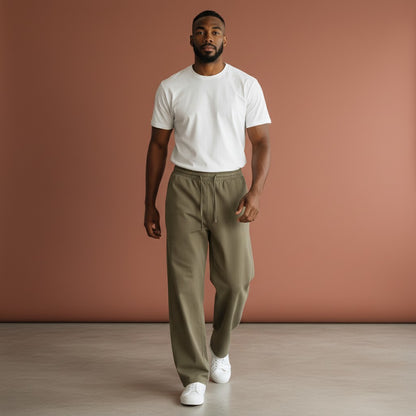 Omina Studio olive green vintage wash unisex loose fit sweatpants made from a soft heavyweight cotton blend.