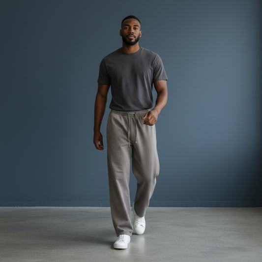 Omina Studio unisex vintage wash grey cotton blend loose sweatpants with drawstring waist and pockets.