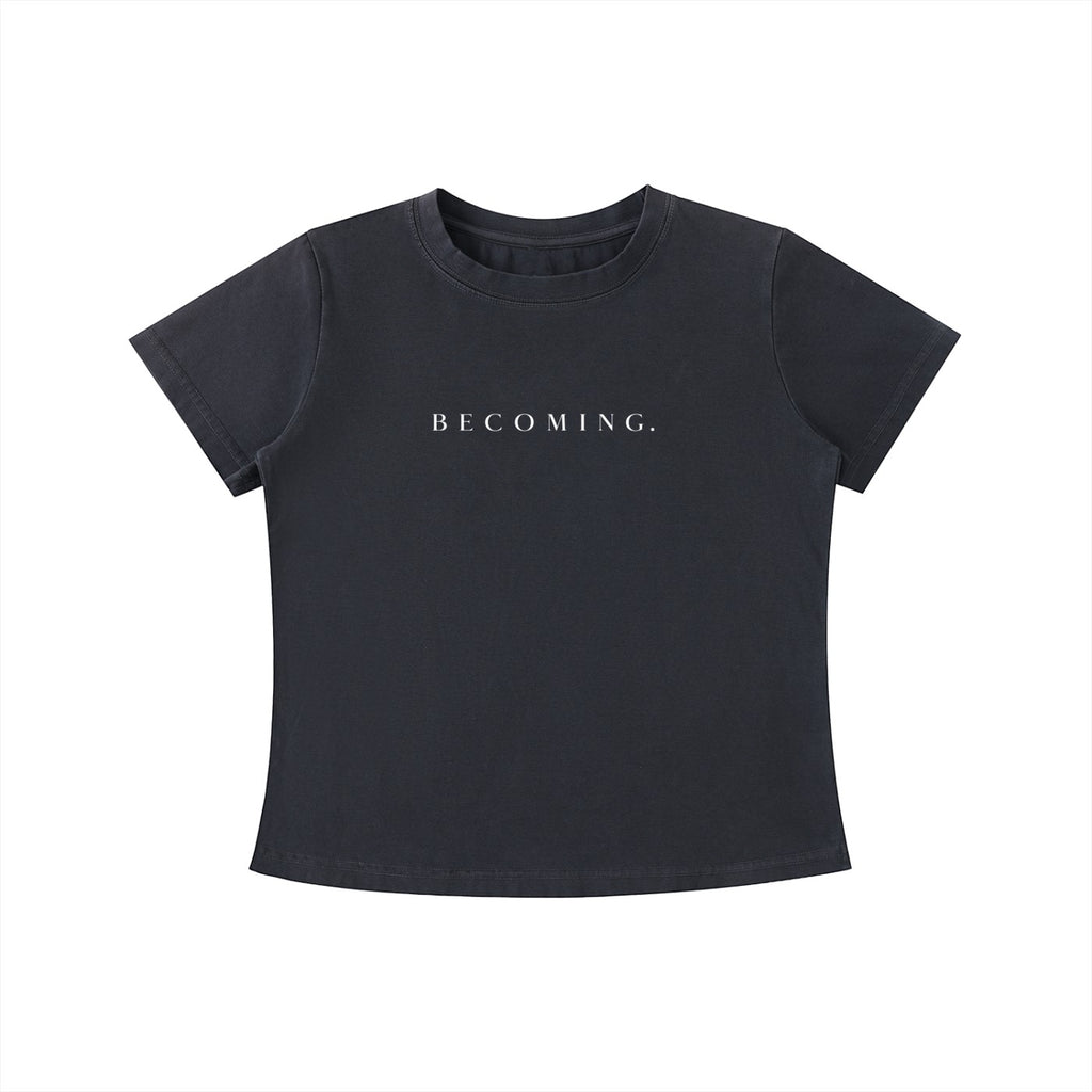 OMINA Essentials dark grey cotton t-shirt with "BECOMING." printed in white. Vintage wash, slim fit.