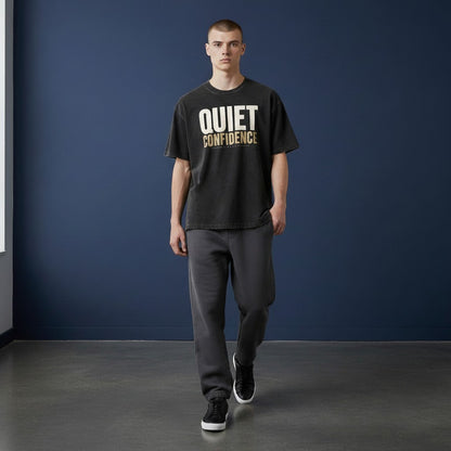 Omina dark grey mineral wash waffle knit t-shirt with "Quiet Confidence" graphic print on chest. Relaxed fit.