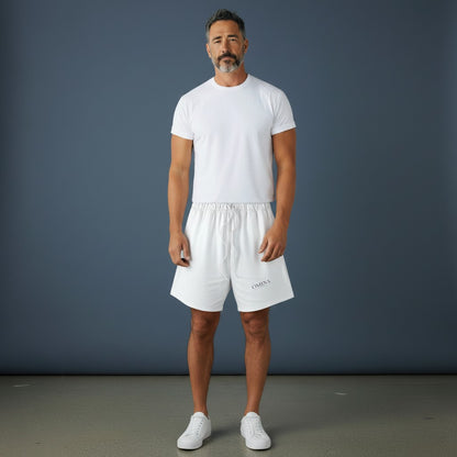 Omina Studio white relaxed fit athletic shorts with drawstring and subtle logo.