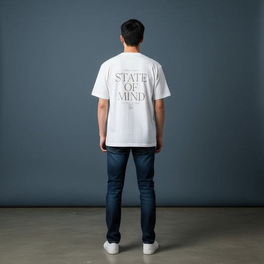 Omina Studio white cotton blend t-shirt with "STATE OF MIND" graphic print on back.