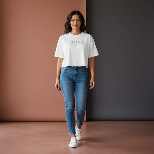 Omina Studio women's white 100% cotton crop top with oversized sleeves and relaxed fit, featuring embroidered Omina Studio logo.
