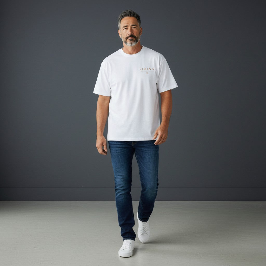 Omina white 100% cotton oversized fit crew neck t-shirt with subtle logo detail on chest.