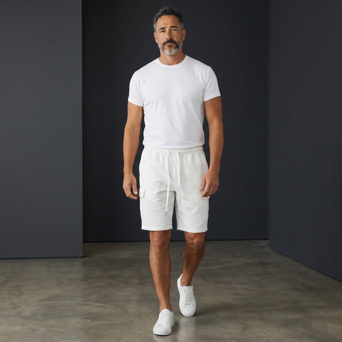 Omina white polyester drawstring cargo shorts with elastic waistband and functional pockets. Relaxed unisex fit.