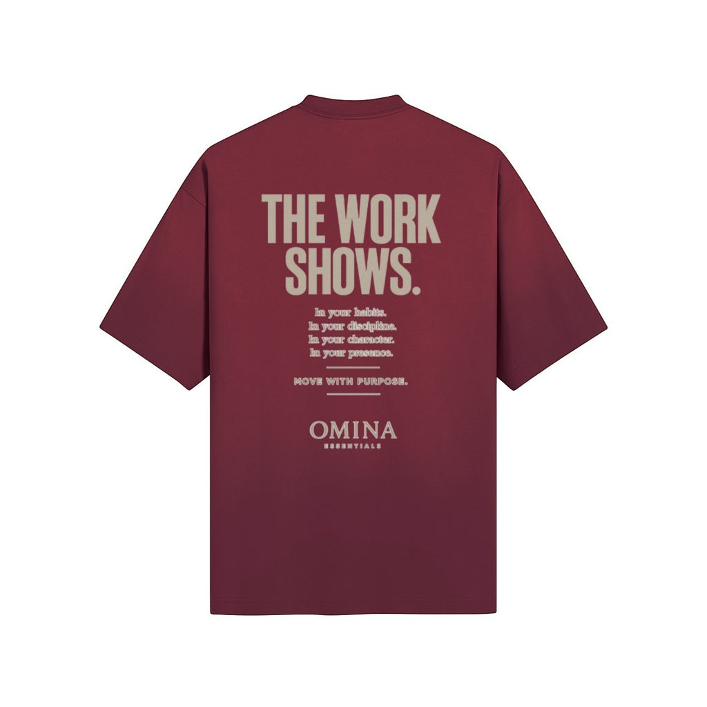 Omina burgundy cotton t-shirt with "THE WORK SHOWS." graphic print on back.
